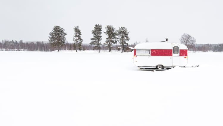white-and-red-old-holiday-ice-fishing-retro-carava-2026-03-19-06-36-36-utc